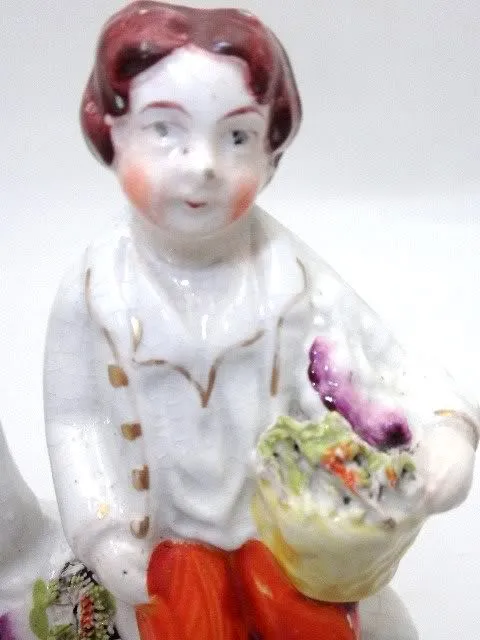 Antique Staffordshire Spill Vase Boy With Flowers