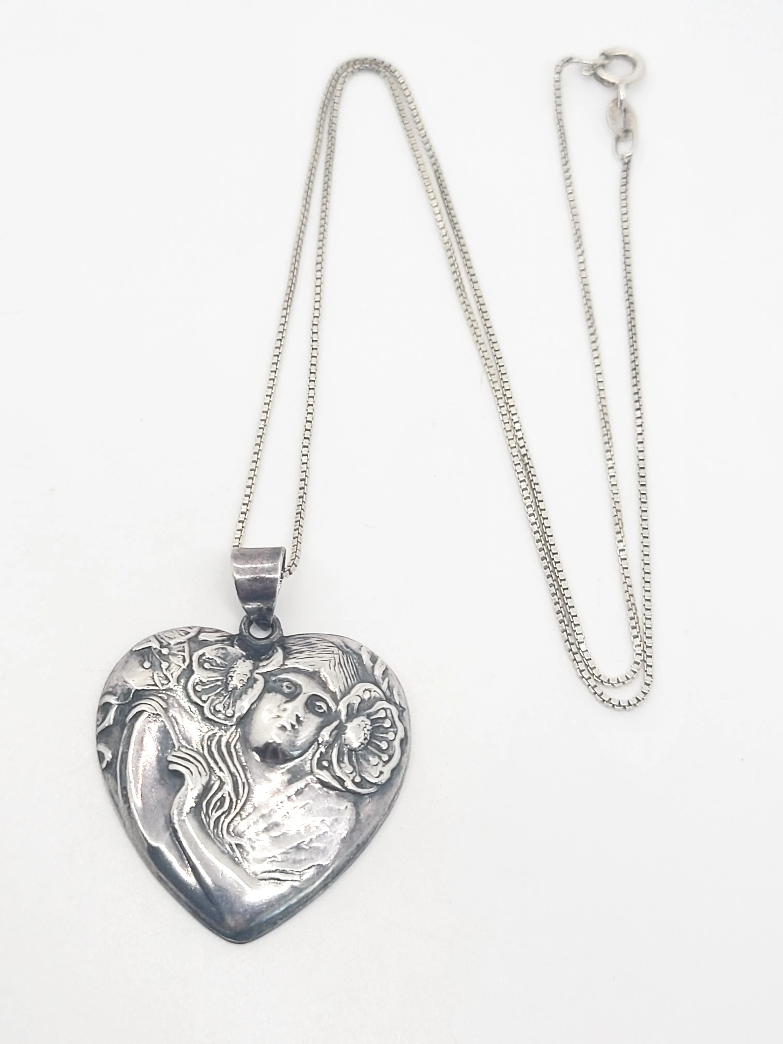 Art Nouveau style Nymph in flowers vintage sterling silver heart pendant