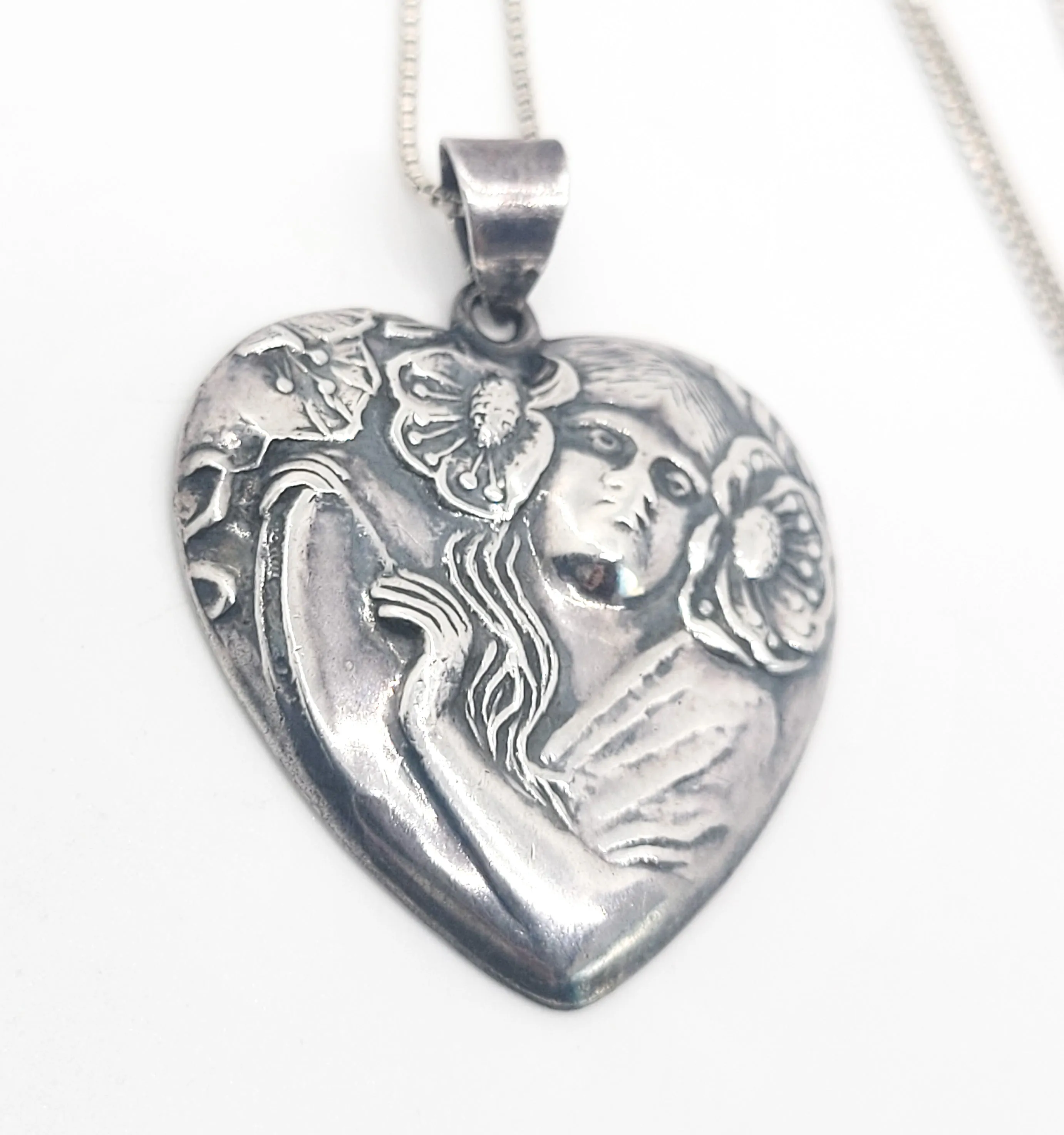 Art Nouveau style Nymph in flowers vintage sterling silver heart pendant