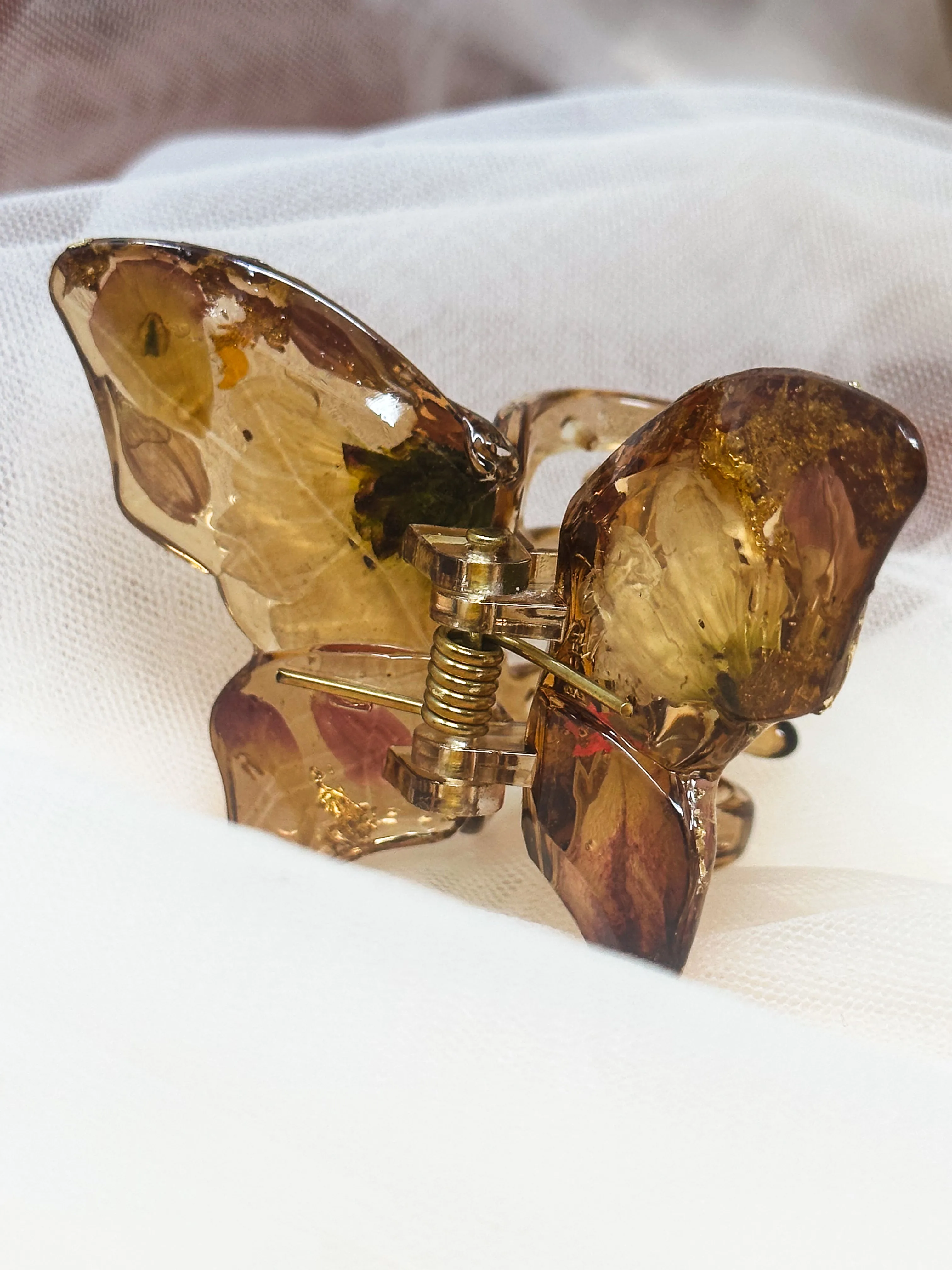 Crystal Brown Butterfly Clip Infused with Real Flowers in Resin.