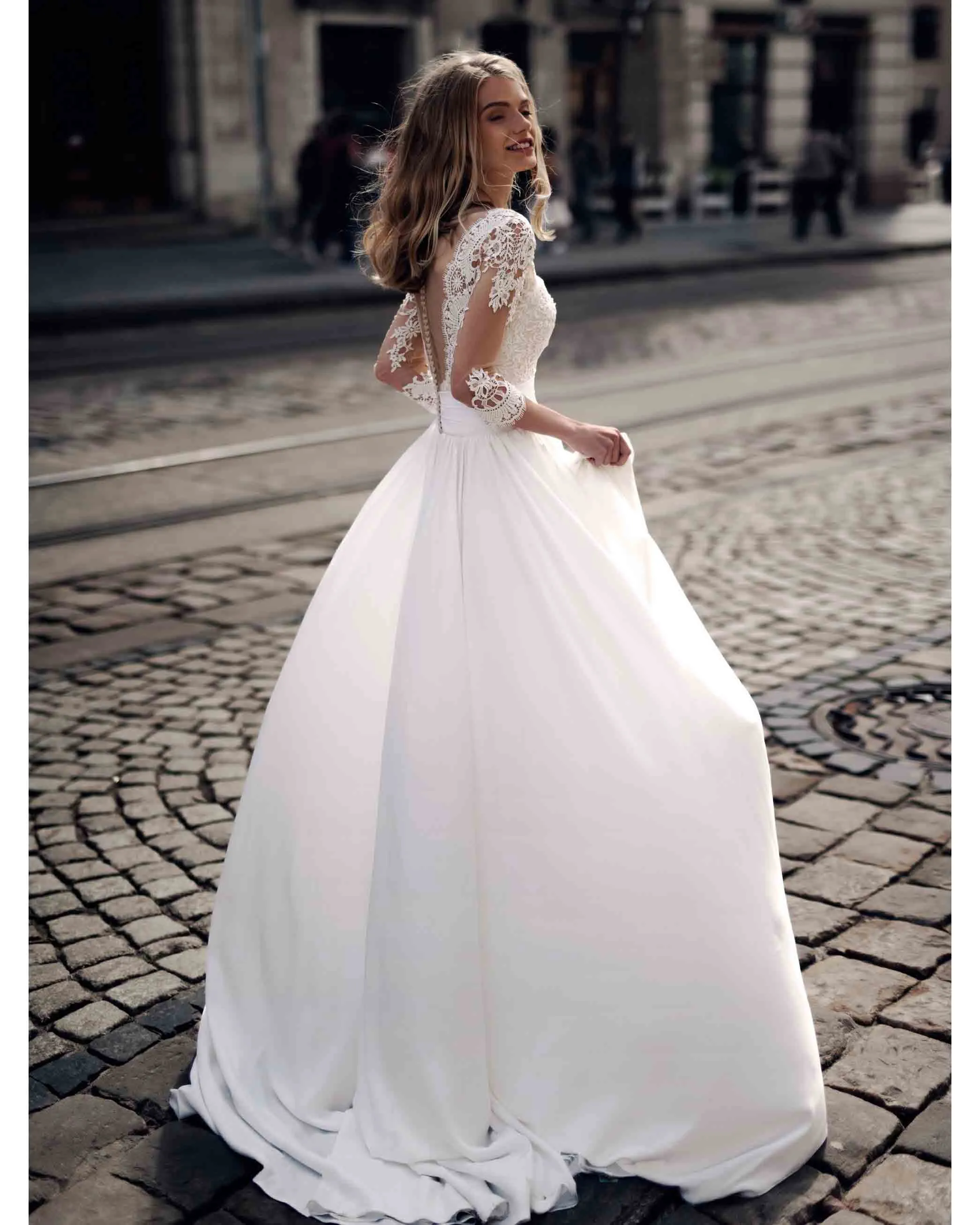 Delicate A-line Lace Wedding Dresses Satin Skirt Sheer Lace 3/4 Sleeves Brides Gowns with Buttons