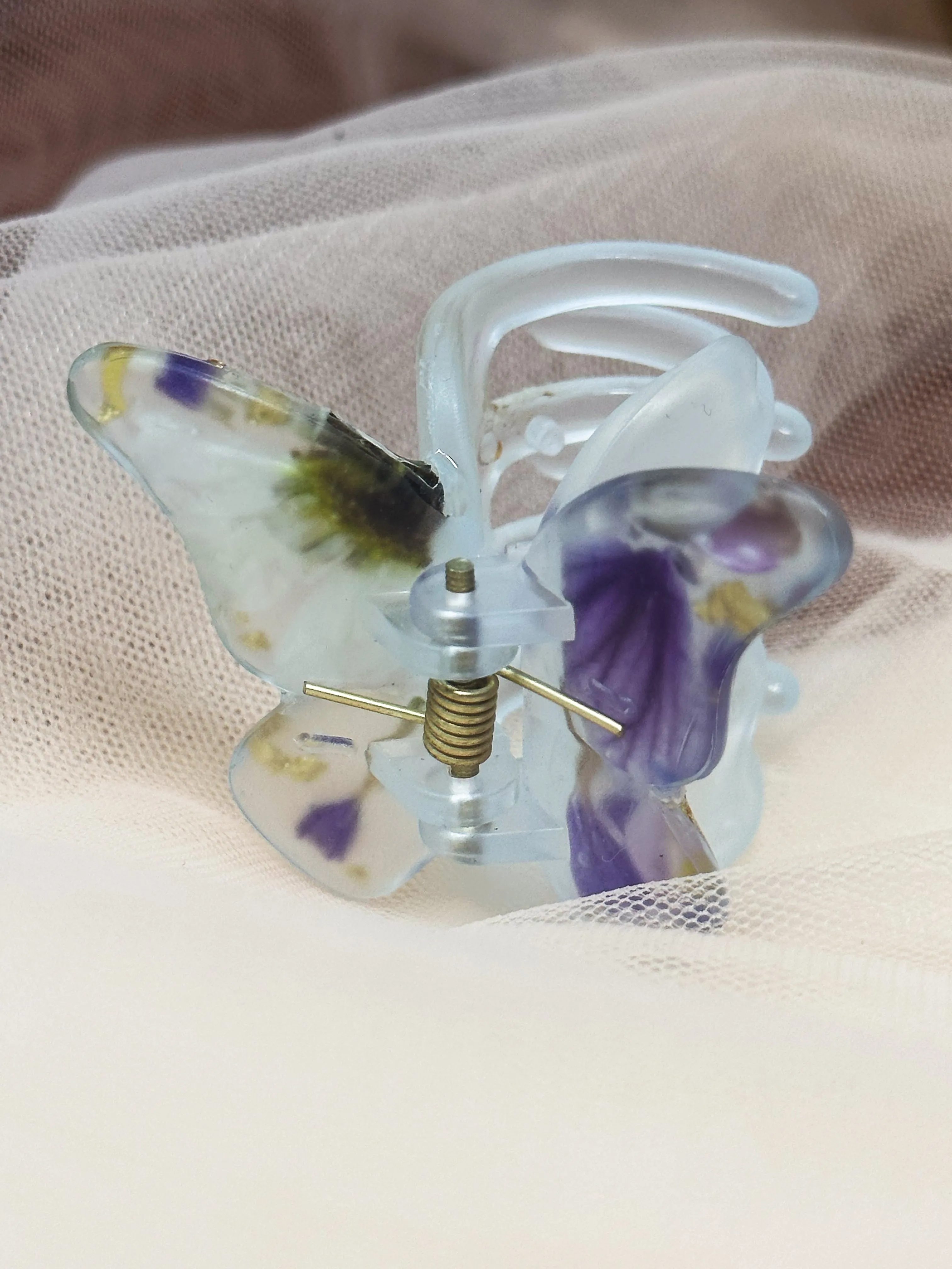 Matte Light Blue Butterfly Clip Infused with Real purple toned Flowers in Resin.