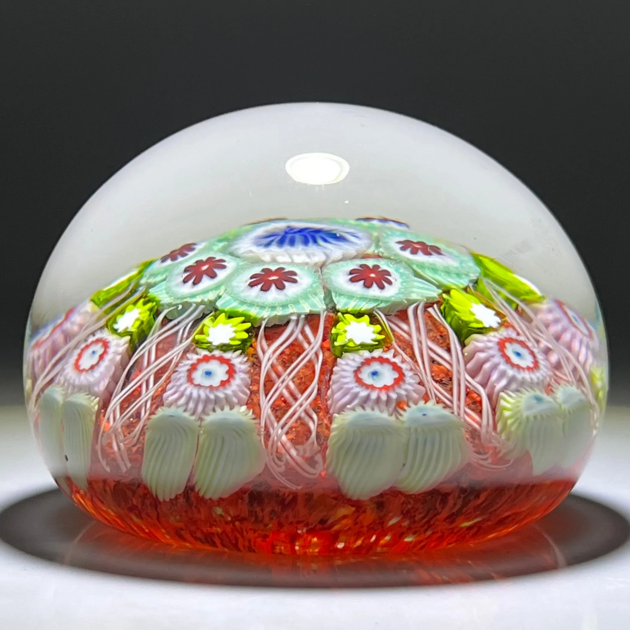 Vintage Strathearn Glass Art Paperweight with Radial Millefiori & Filigree Design on Red