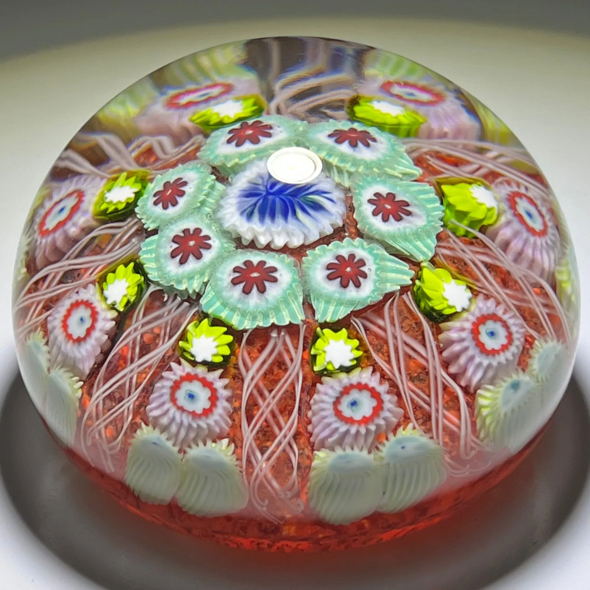 Vintage Strathearn Glass Art Paperweight with Radial Millefiori & Filigree Design on Red